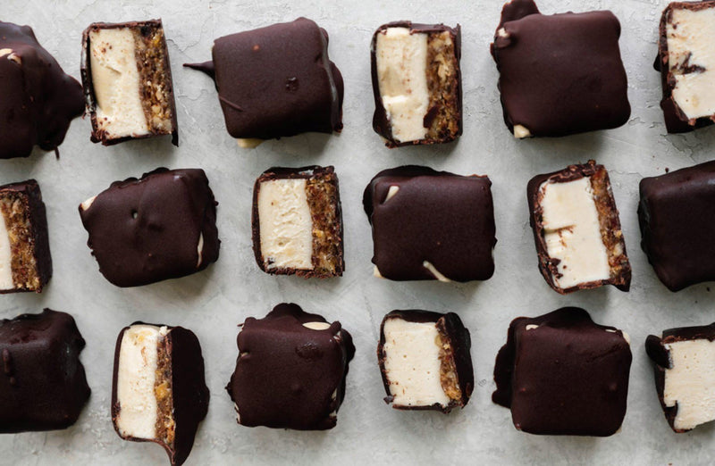 VEGAN CHOCOLATE DIPPED CASHEW CHEESECAKE BITES
